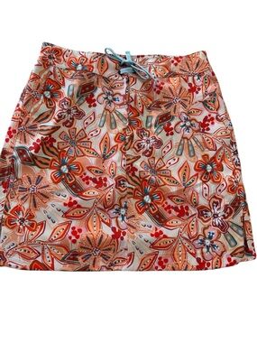 RipSkirt Hawaii wrap skirt featuring a vibrant orange blue floral pattern small
